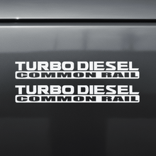 Load image into Gallery viewer, White Turbo Diesel Common Rail stickers on dark panel
