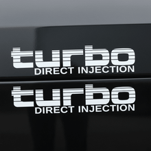 Load image into Gallery viewer, White Turbo Direct Injection stickers on dark panel
