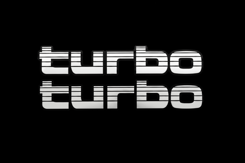 White Turbo sticker macro close-up black background