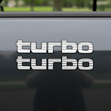 Load image into Gallery viewer, White Turbo sticker on dark charcoal 4WD panel
